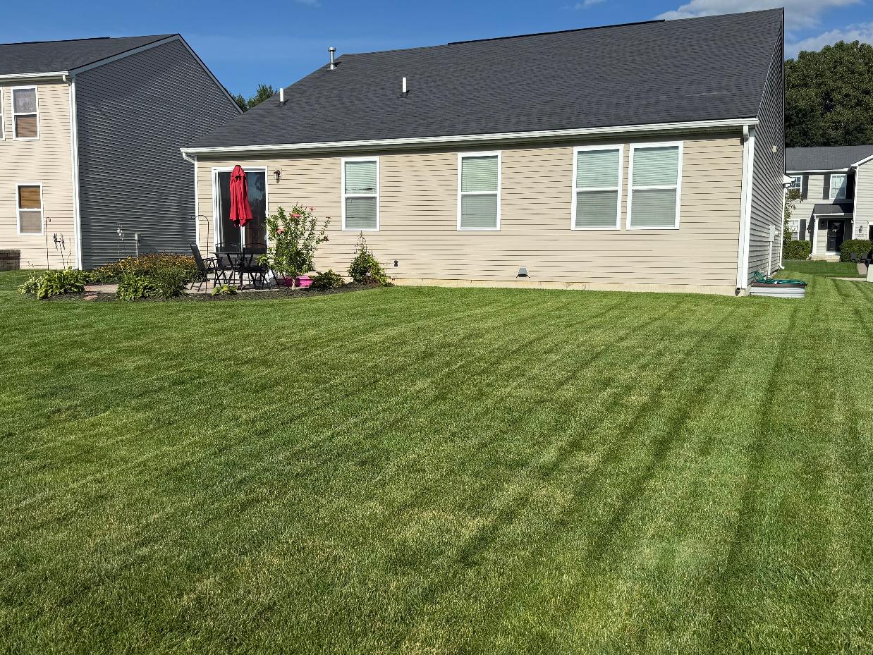 SRS completed push-mower lawn care job with address obscured